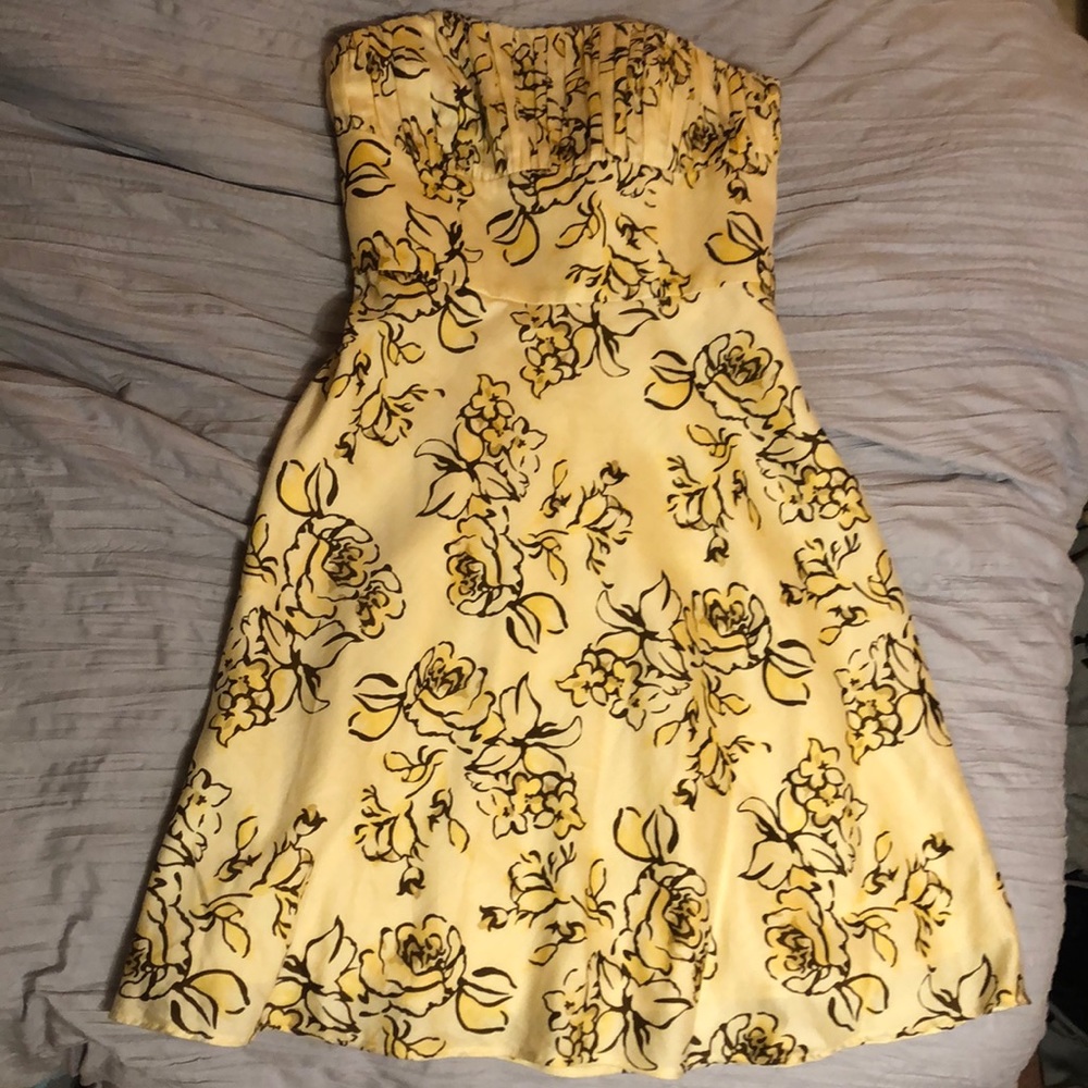 Yellow dress with brown flowers